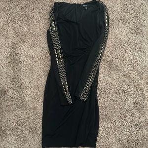 Lightly worn black Guess dress with gold embellishments on the sleeves size 2